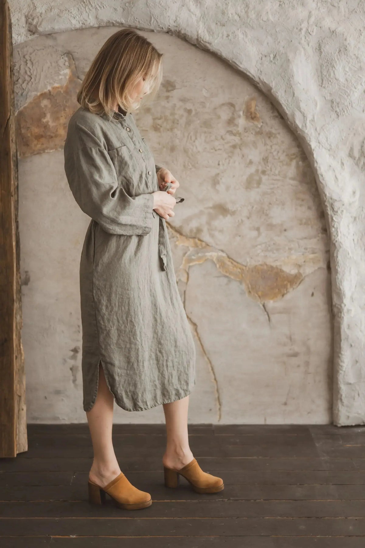 Side view showing slit and tie belt of the Linen Belted Portofino Shirt Dress 605.
