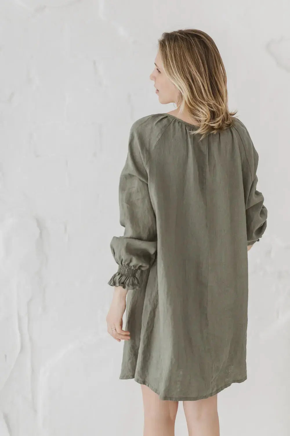 Linen Mini Dress Marea — back view with bishop sleeves and smocked cuffs