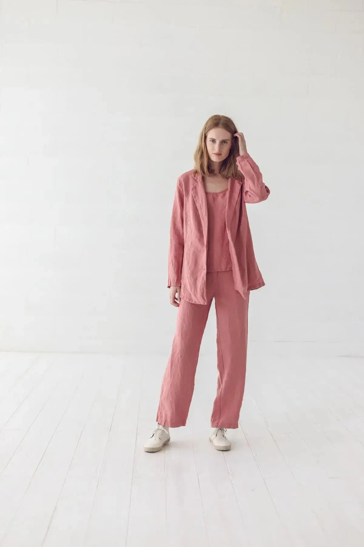 Natural lifestyle shot of a model wearing a linen jacket