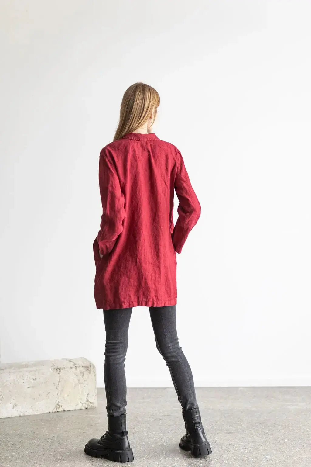 Full back view of a red tailored linen jacket with functional pockets