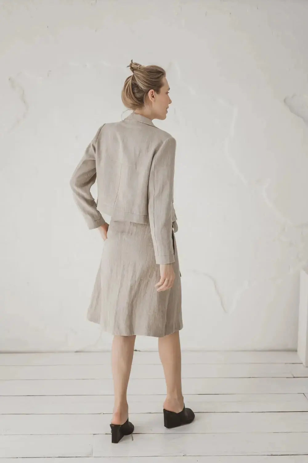 Structured Cropped Linen Blazer — back view with linen skirt and heels
