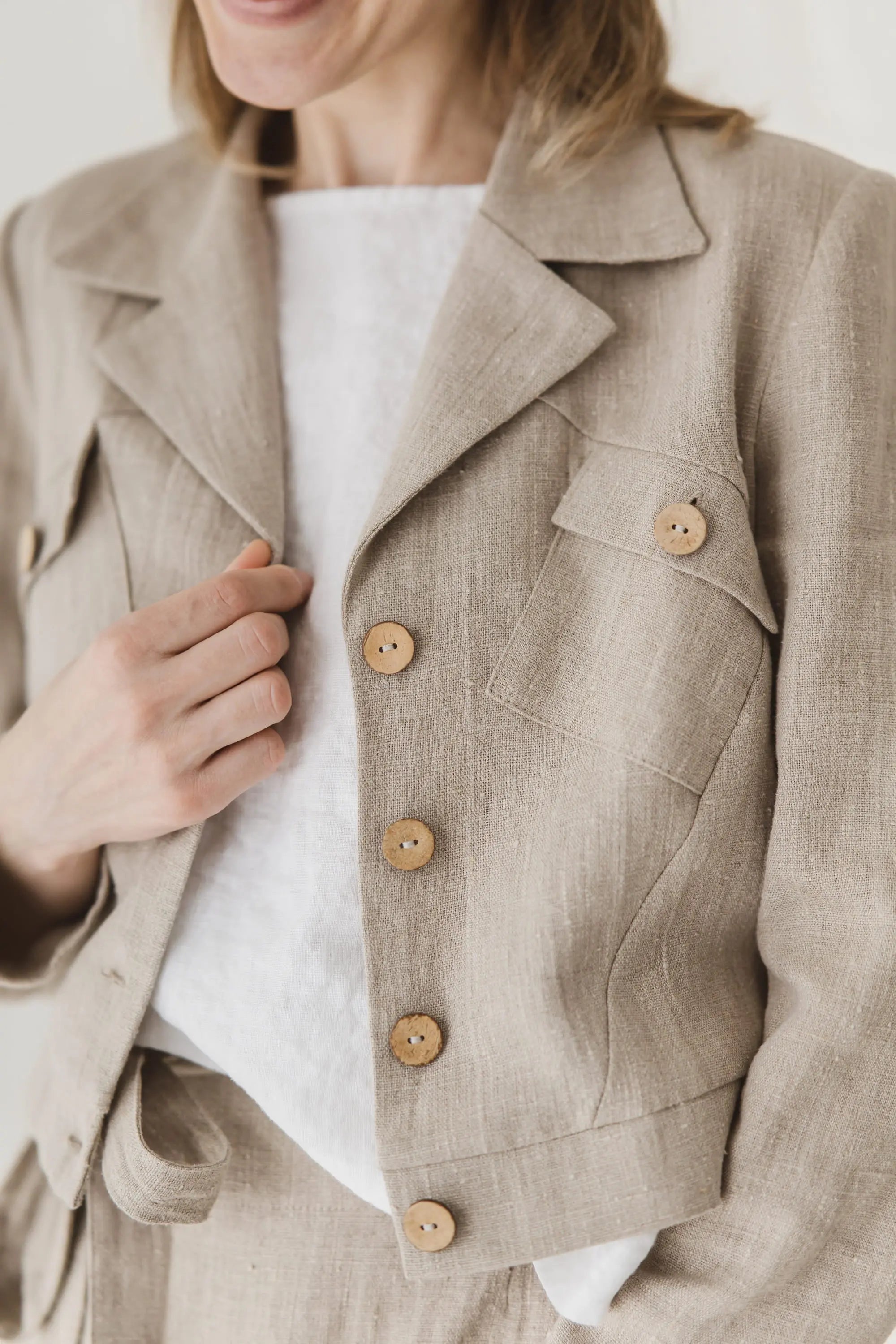 Structured Cropped Linen Blazer — front detail with coconut shell buttons